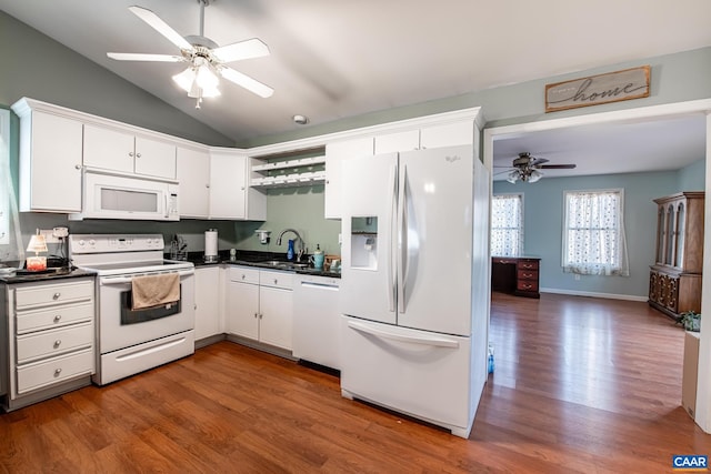 kitchen with white cabinetry, dark hardwood / wood-style flooring, and white appliances