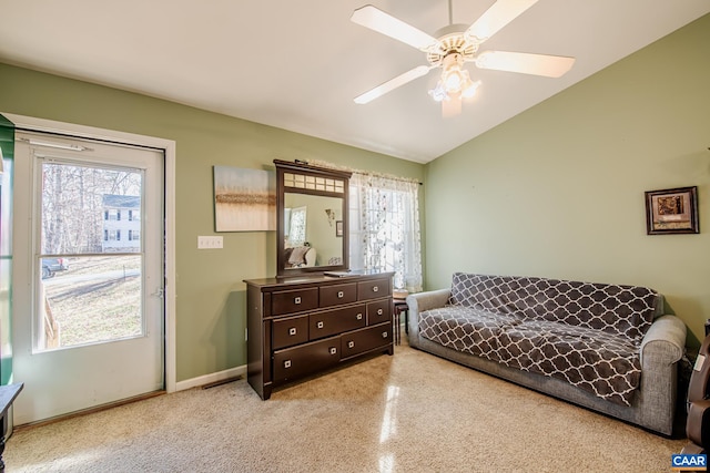 sitting room featuring ceiling fan and lofted ceiling