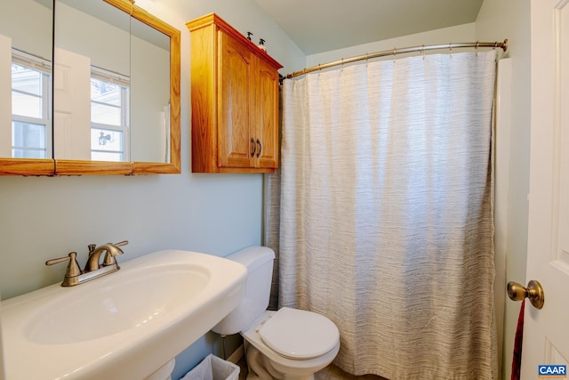 bathroom with sink and toilet