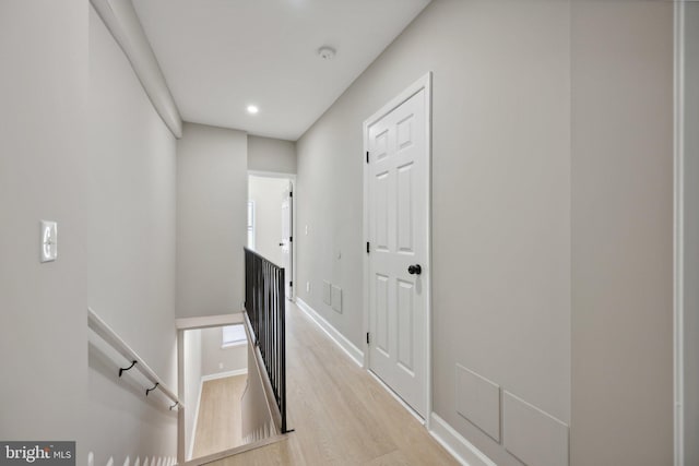 1155 Washington Blvd, Baltimore, MD 21230 - corridor with an upstairs landing, wood finished floors, baseboards, and recessed lighting