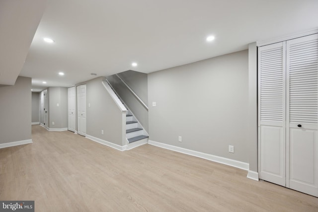 1155 Washington Blvd, Baltimore, MD 21230 - finished below grade area with light wood-type flooring, baseboards, recessed lighting, and stairs