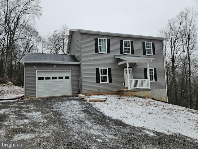 view of front of property featuring a garage