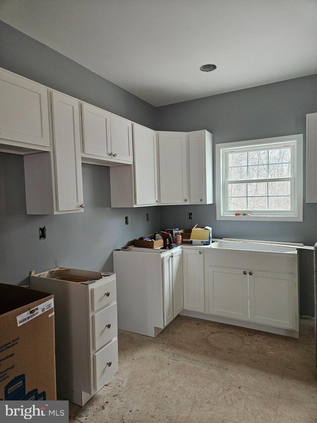 kitchen with white cabinets