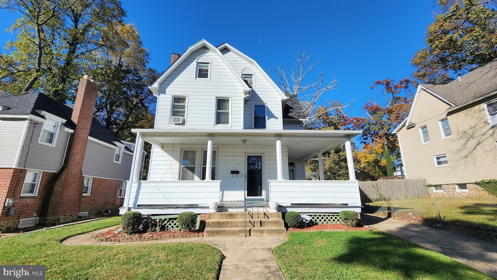 view of front of home with a front yard