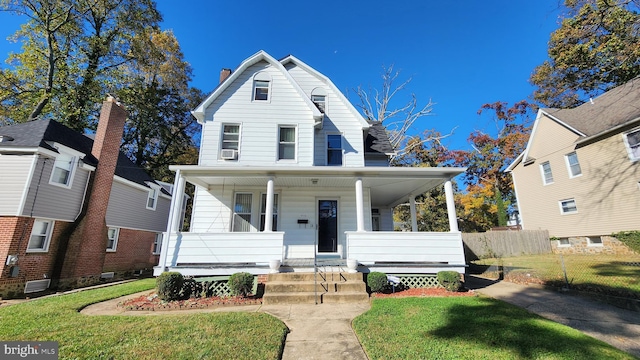 view of front of home with a front yard