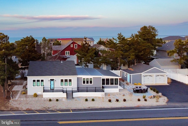 view of front of property featuring a garage