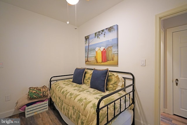 bedroom with wood-type flooring