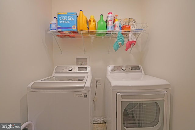 laundry area with washer and dryer