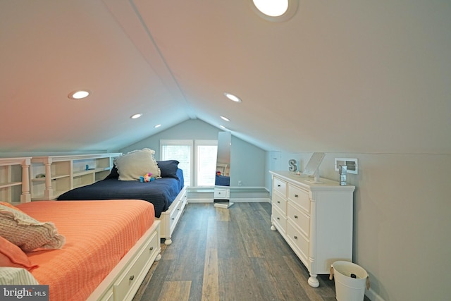 bedroom with lofted ceiling and dark hardwood / wood-style floors