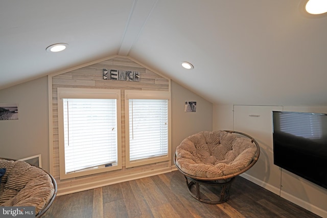 sitting room with lofted ceiling and hardwood / wood-style floors