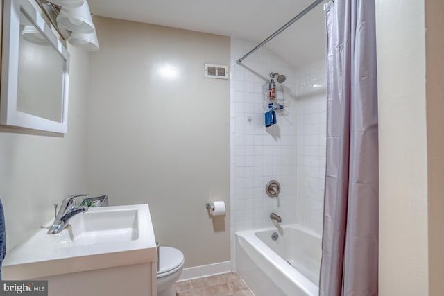 full bathroom featuring vanity, toilet, and shower / bath combo with shower curtain