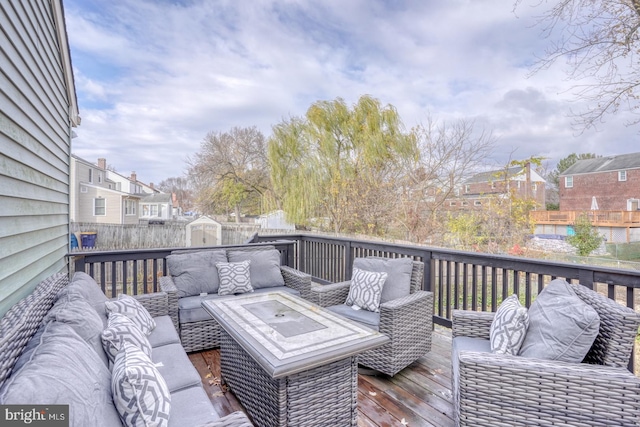 deck featuring an outdoor living space