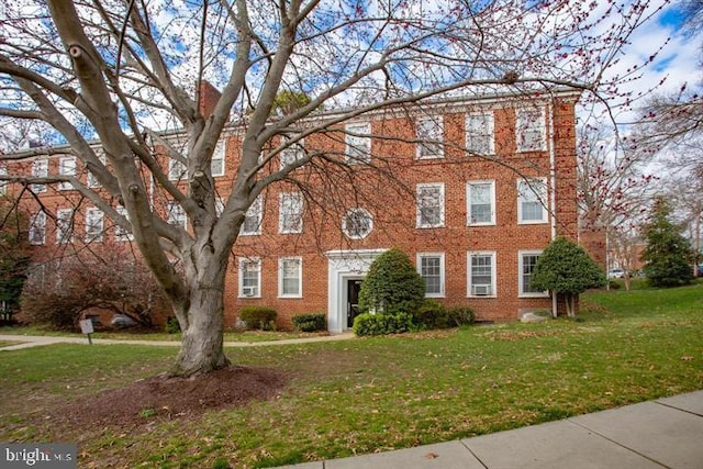 colonial house with a front lawn