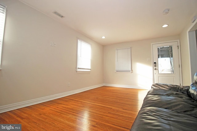 unfurnished living room with light hardwood / wood-style flooring