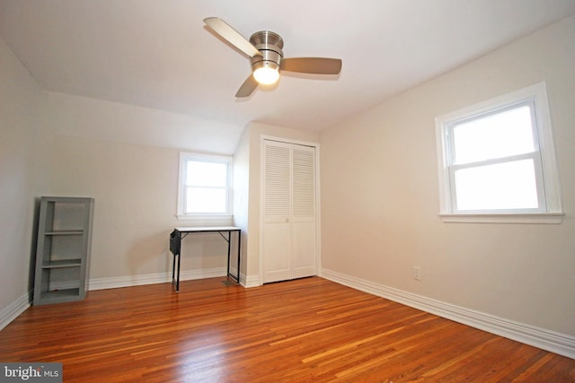 bonus room featuring ceiling fan and wood-type flooring