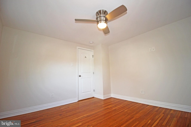 unfurnished room featuring ceiling fan and wood-type flooring