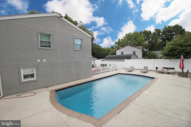 view of pool with a patio area