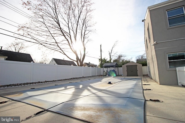 view of patio / terrace with a storage unit