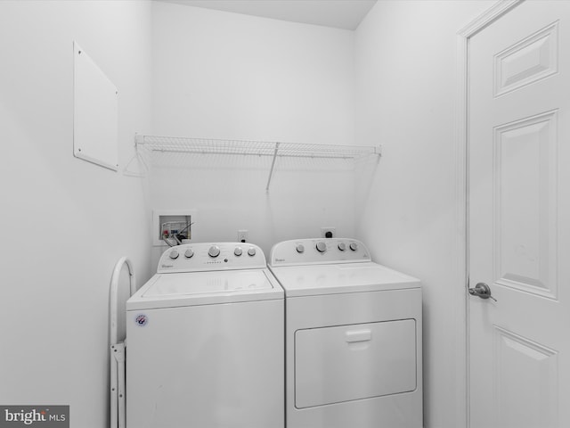 laundry room with independent washer and dryer