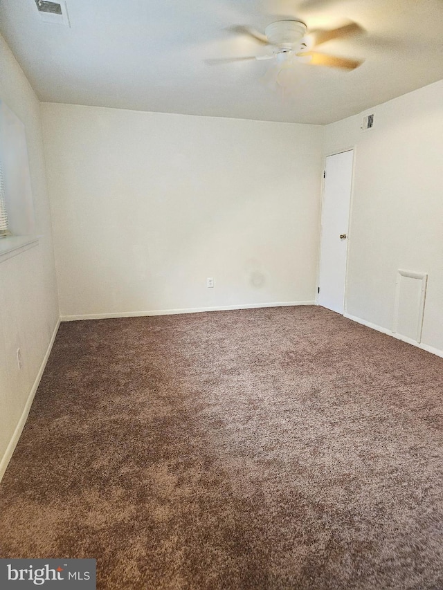 carpeted empty room with ceiling fan