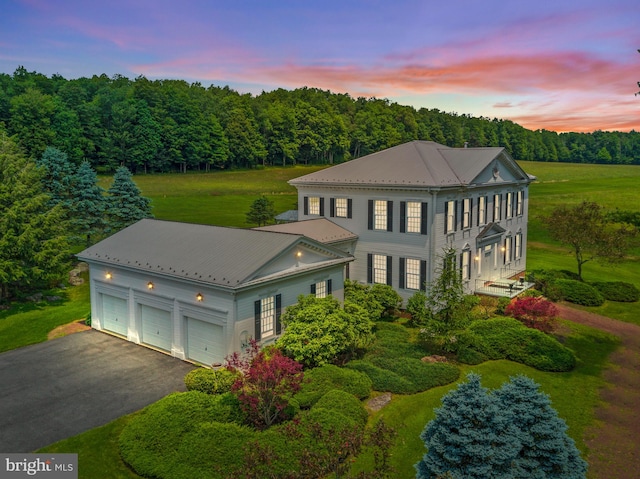 view of front of property with a garage