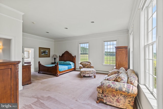 bedroom with ornamental molding, light carpet, baseboard heating, and ensuite bath