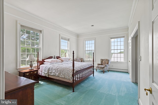 bedroom with multiple windows, baseboard heating, and ornamental molding