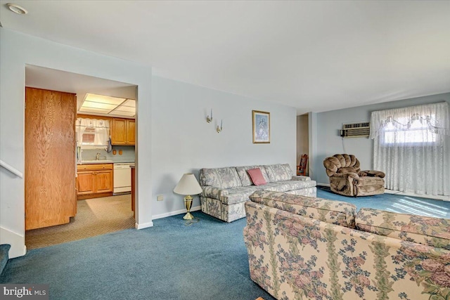 living room with a wall mounted air conditioner, light colored carpet, and sink