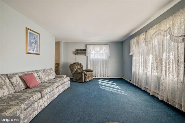 carpeted living room with an AC wall unit