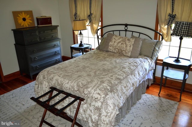 bedroom featuring hardwood / wood-style flooring