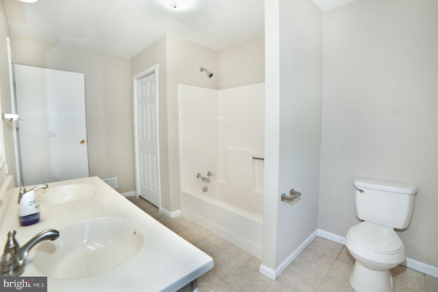 full bathroom with tile patterned floors, vanity, shower / bath combination, and toilet