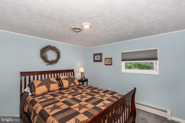 carpeted bedroom featuring baseboard heating, crown molding, and a textured ceiling