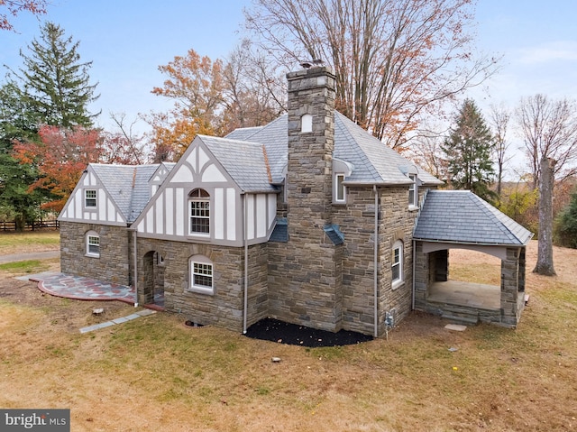 view of home's exterior featuring a lawn