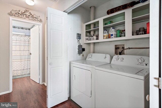 laundry room featuring dark wood-type flooring and washing machine and clothes dryer