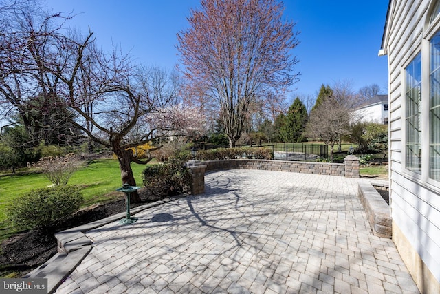 view of patio with fence