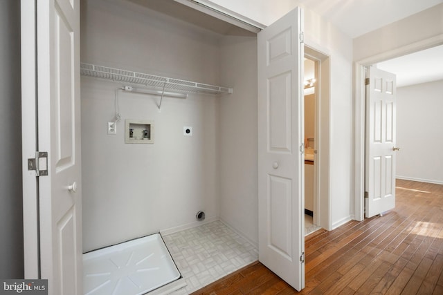 washroom with electric dryer hookup, washer hookup, and hardwood / wood-style floors