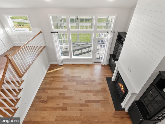 living room with light hardwood / wood-style flooring