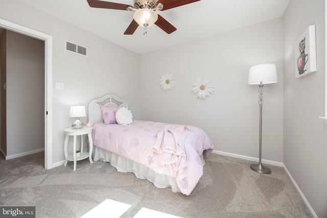 bedroom with visible vents, baseboards, a ceiling fan, and carpet flooring