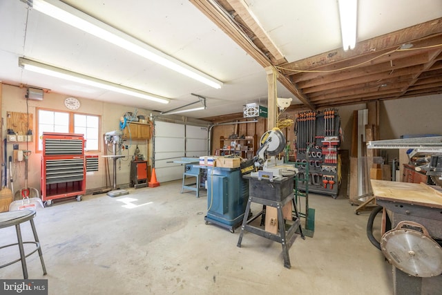 garage with a workshop area