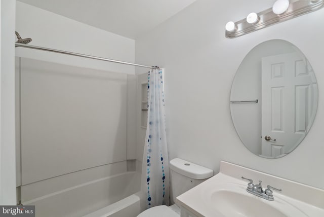 full bathroom featuring vanity, toilet, and shower / tub combo