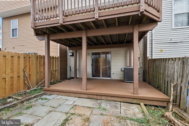 exterior space featuring a deck and central air condition unit