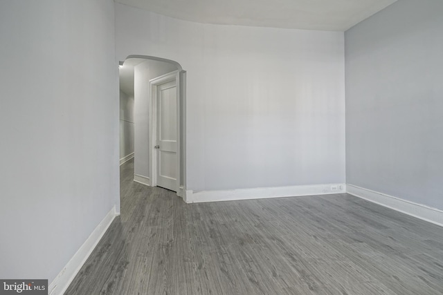 unfurnished room featuring hardwood / wood-style floors