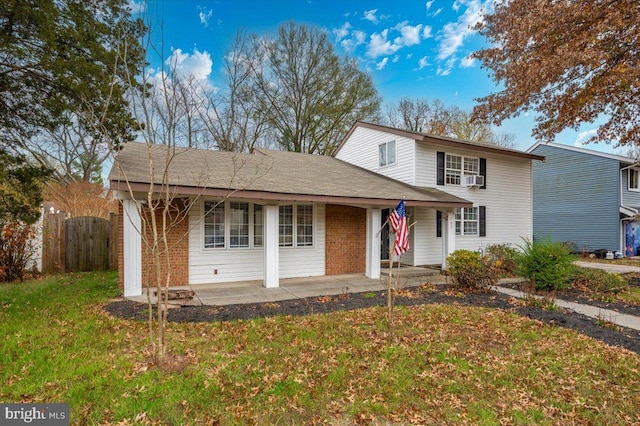 view of front property featuring a front yard