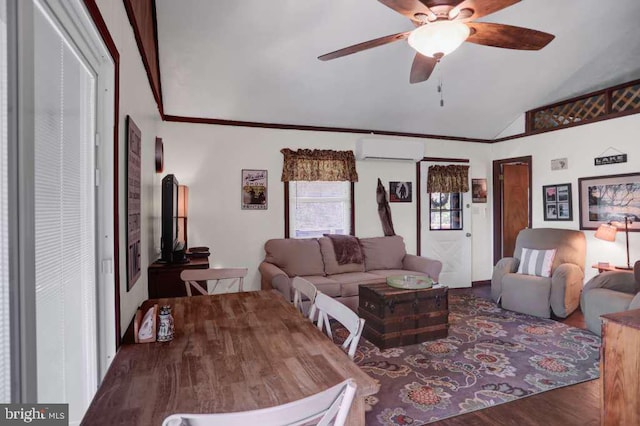 living room with lofted ceiling, dark wood-type flooring, crown molding, ceiling fan, and a wall mounted AC