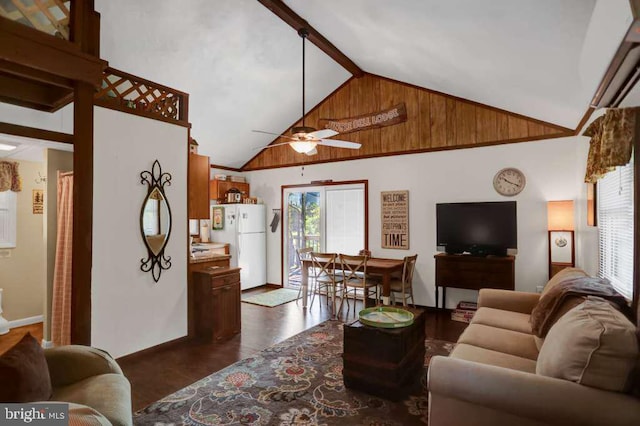 living room with beam ceiling, high vaulted ceiling, a wealth of natural light, and ceiling fan