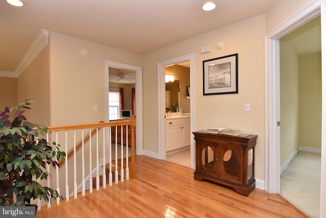 hall with light hardwood / wood-style floors