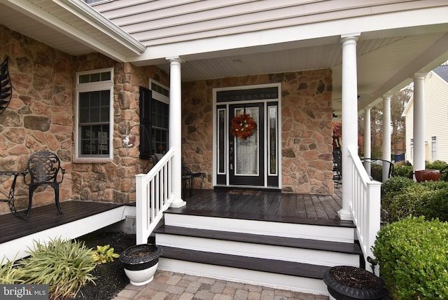 property entrance with covered porch