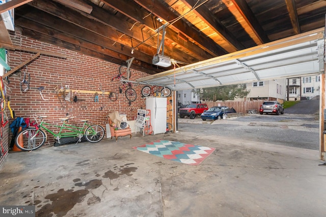 garage featuring a garage door opener