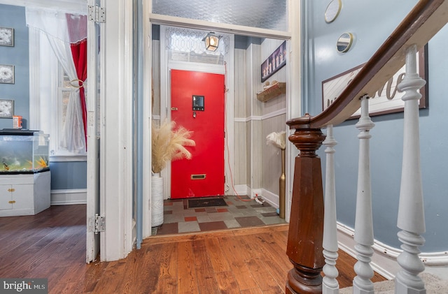 entrance foyer featuring dark hardwood / wood-style flooring