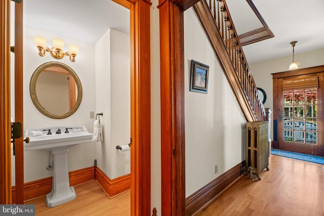 corridor featuring light hardwood / wood-style floors